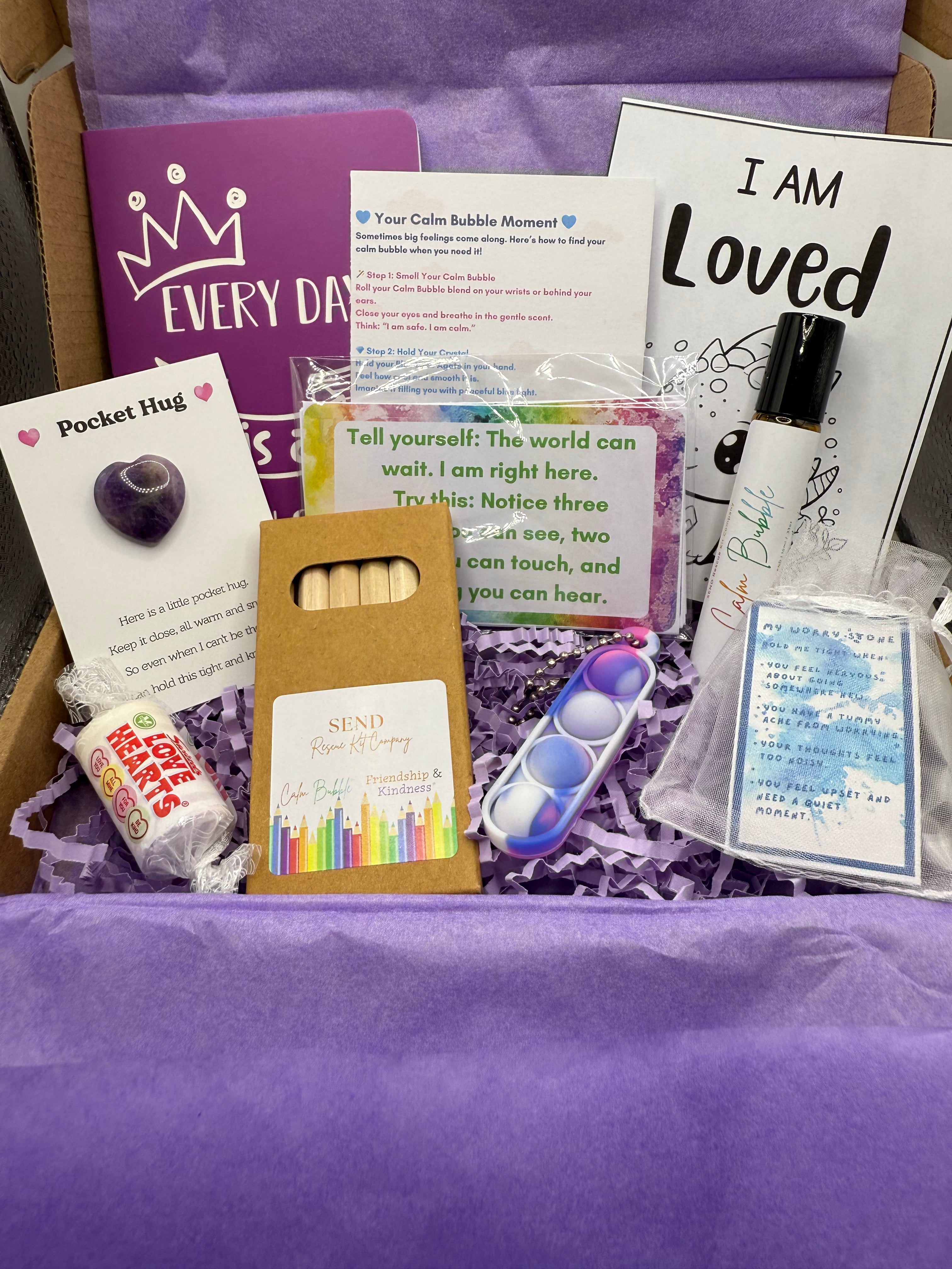 Children’s Calm Bubble Kit with calm essential oil blend in a roller bottle, worry stone, fidget toy, pencils and affirmations